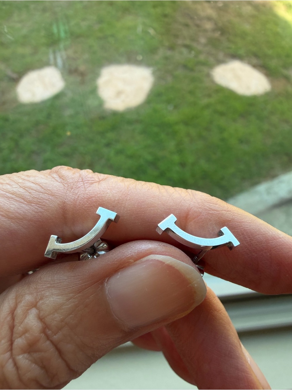 Tiffany & Co. Tiffany T Smile mini earrings in 18k white gold